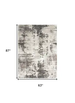 5' X 7' Tan Abstract Power Loom Area Rug