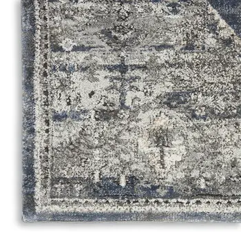 4' X 6' Blue Floral Power Loom Distressed Area Rug