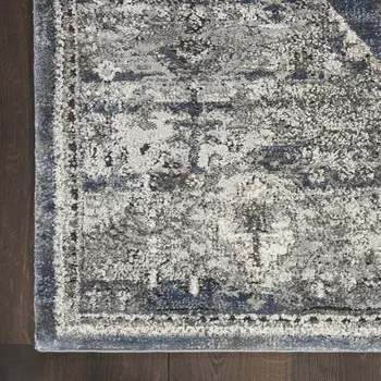 4' X 6' Blue Floral Power Loom Distressed Area Rug