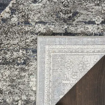 5' X 7' Blue Floral Power Loom Distressed Area Rug