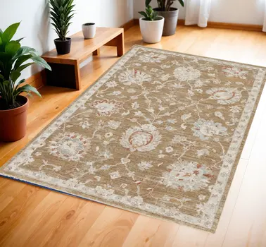 4' X 6' Brown Floral Power Loom Distressed Area Rug