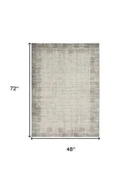 4' X 6' Ivory and Gray Abstract Area Rug