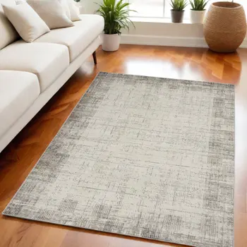 5' X 7' Ivory and Gray Abstract Area Rug