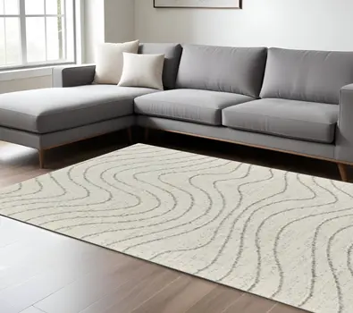 8' X 11' Cream and Beige Abstract Area Rug