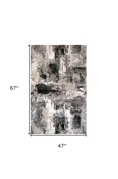4' X 6' Black Gray and Beige Abstract Area Rug