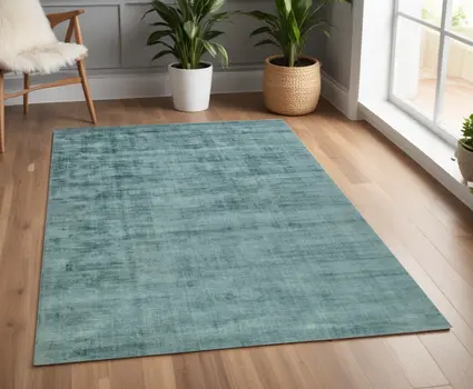 4' X 6' Sea Green And Light Blue Abstract Hand Woven Area Rug
