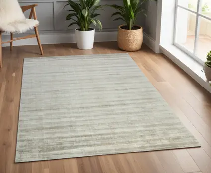 4' X 6' Ivory And Gray Abstract Hand Woven Area Rug