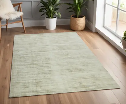 4' X 6' Sand And Ivory Abstract Hand Woven Area Rug