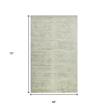 4' X 6' Sand And Ivory Abstract Hand Woven Area Rug