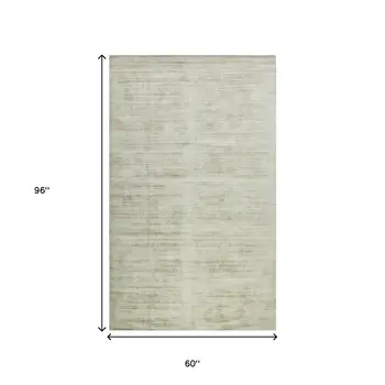 5' X 8' Sand And Ivory Abstract Hand Woven Area Rug
