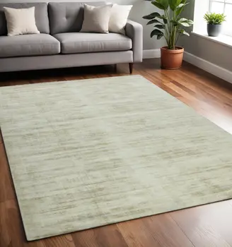 5' X 8' Sand And Ivory Abstract Hand Woven Area Rug