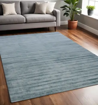 5' X 8' Light Blue And Dark Blue Striped Hand Woven Area Rug