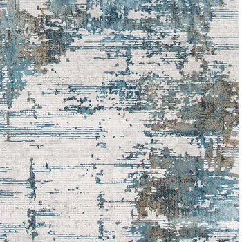 5' X 8' Ivory Blue And Brown Abstract Area Rug With Fringe