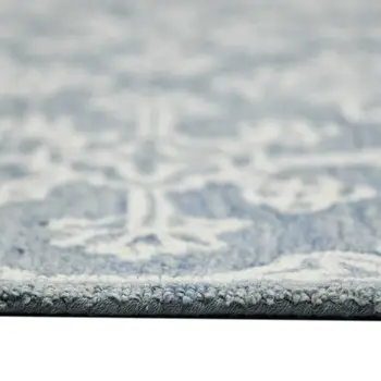2' X 3' Sky Blue And Ivory Wool Oriental Hand Hooked Area Rug