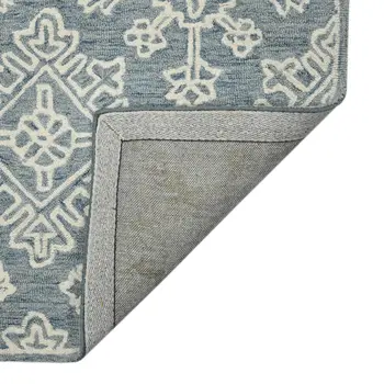 8' X 10' Sky Blue And Ivory Wool Oriental Hand Hooked Area Rug