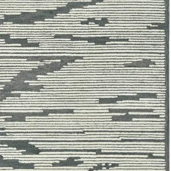 5' X 8' Dark Gray And Ivory Wool Abstract Hand Hooked Area Rug