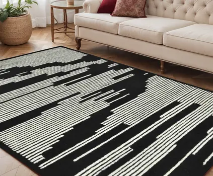 5' X 8' Black And Ivory Wool Abstract Hand Hooked Area Rug