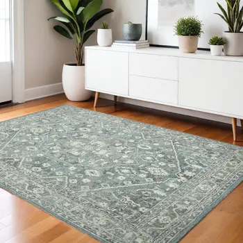 4' X 6' Sky Blue Gray And Ivory Wool Oriental Hand Tufted Area Rug