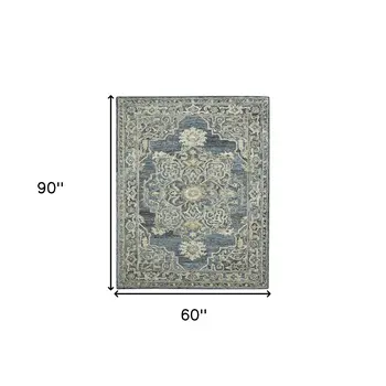 5' X 7' Denim Blue And Ivory Wool Oriental Hand Tufted Area Rug