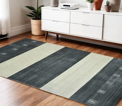 4' X 6' Charcoal And Ivory Wool Striped Hand Woven Area Rug