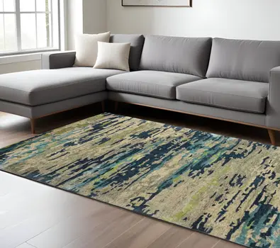8' X 10' Sand And Green Wool Abstract Hand Tufted Area Rug