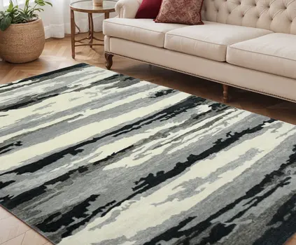 5' X 8' Dark Gray Black And Ivory Wool Abstract Hand Tufted Area Rug