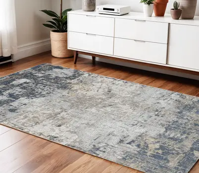 4' X 6' Beige Dark Blue And Gray Abstract Area Rug