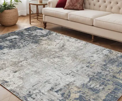 5' X 8' Beige Dark Blue And Gray Abstract Area Rug