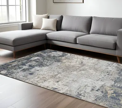 8' X 10' Beige Dark Blue And Gray Abstract Area Rug