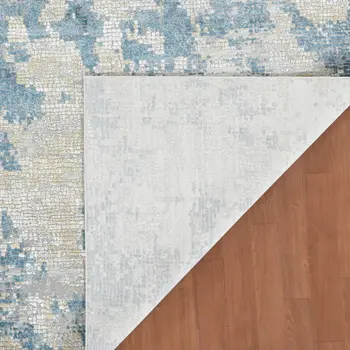 8' X 10' Ivory And Sky Blue Abstract Area Rug