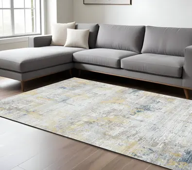 8' X 10' Gold Ivory And Blue Abstract Area Rug