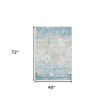 4' X 6' Gold Sky Blue And Ivory Abstract Area Rug