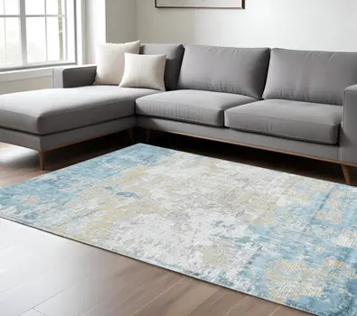 8' X 10' Gold Sky Blue And Ivory Abstract Area Rug