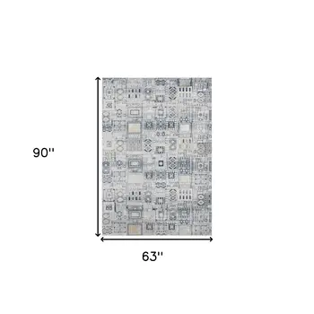 5' X 8' Ivory Black And Gold Ikat Area Rug