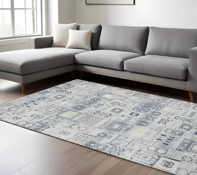 10' X 14' Ivory Black And Gold Ikat Area Rug