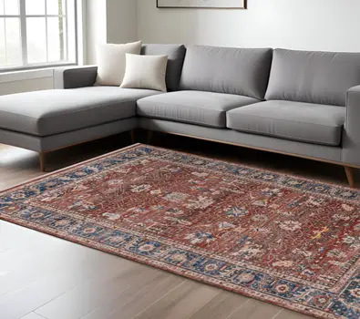 7' X 10' Red Beige And Blue Oriental Area Rug With Fringe