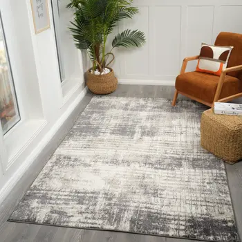 7' X 9' Gray And Ivory Abstract Area Rug