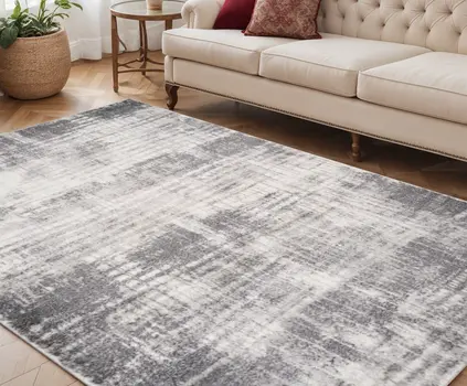 5' X 8' Cream And Gray Abstract Area Rug