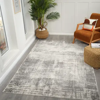 7' X 9' Cream And Gray Abstract Area Rug