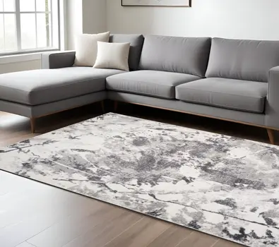 7' X 9' Ivory And Gray Abstract Area Rug