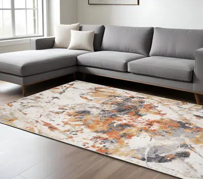 9' X 12' Ivory Orange And Gray Abstract Area Rug