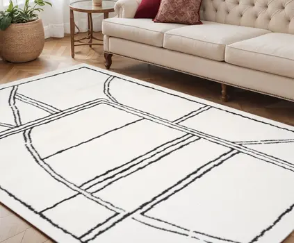 5' X 7' Ivory And Black Geometric Area Rug