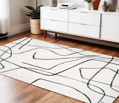 4' X 6' Ivory And Black Abstract Area Rug