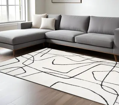 9' X 12' Ivory And Black Abstract Area Rug