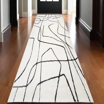 3' X 10' Ivory And Black Abstract Runner Rug