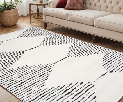 5' X 7' Ivory And Black Geometric Area Rug