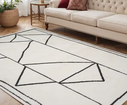 5' X 7' Ivory And Black Geometric Area Rug