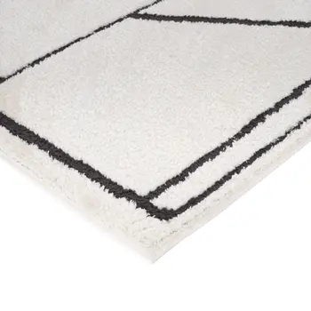 5' X 7' Ivory And Black Geometric Area Rug