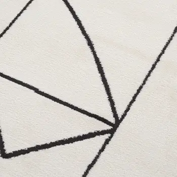 5' X 7' Ivory And Black Geometric Area Rug