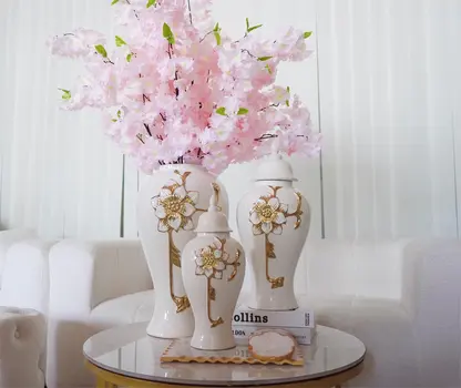24" White and Gold Floral Urn Ceramic Ginger Jar With Sculptural Details